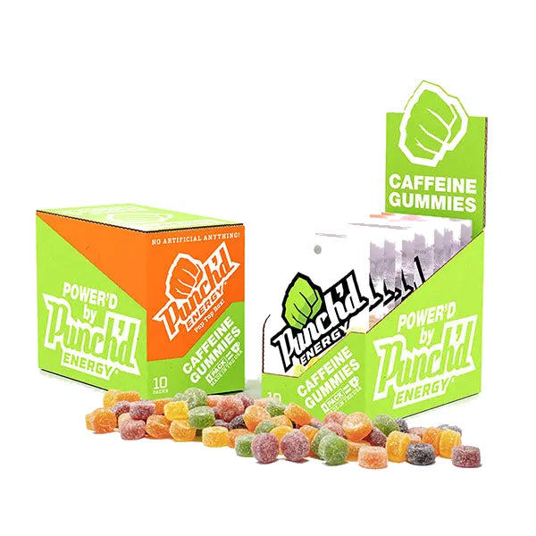 Punch'd Energy gummies scattered on white